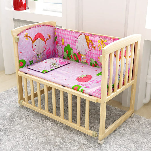 Wooden Baby Cot with Pink Bedding