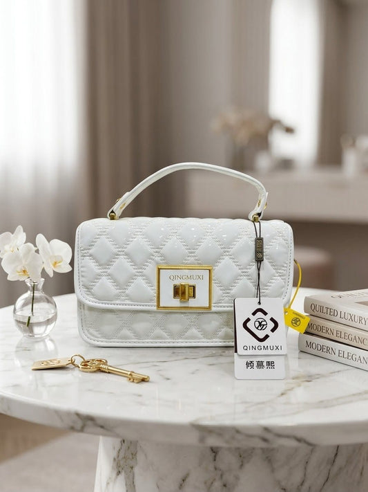 The Golden Quilted Top-Handle Bag in Pearl White