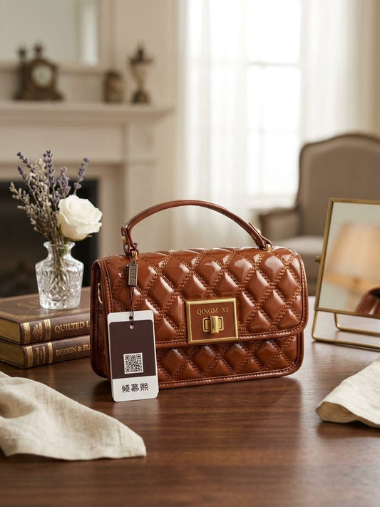 The Golden Quilted Top-Handle Bag in Caramel Brown