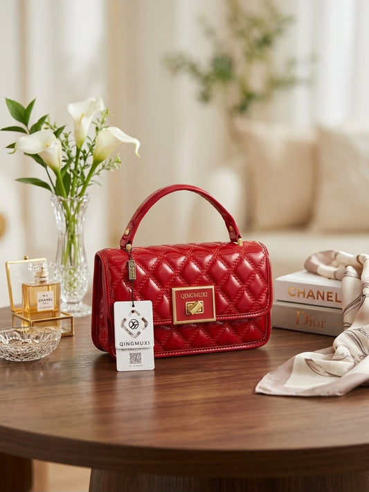 The Golden Quilted Top-Handle Bag in Ruby Red