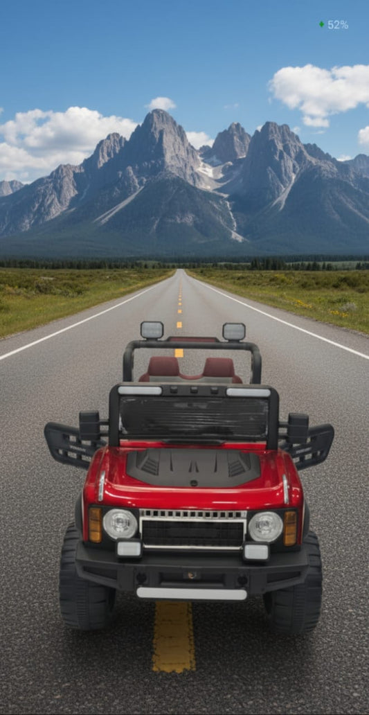 Red Ride-On Jeep on Mountain Road
